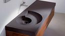 Ammonite Washbasin merupakan Wastafel berbentuk seperti ammonoidea dari keluarga chepalopoda, binatang purbakala dari masa 400 juta tahun lalu. Strukturnya spiral, sehingga air akan mengalir seperti menuruni tangga. (nash-remont.com)