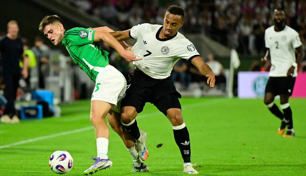 Di babak kedua, Die Mannschaft tampil dominan dan berusaha lebih tenang dalam penguasaan bola. (INA FASSBENDER/AFP)