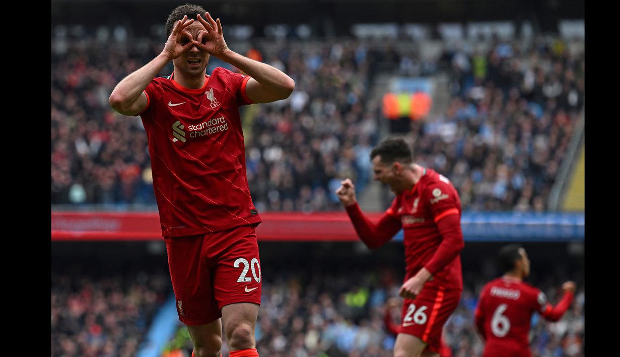 Striker Liverpool, Diogo Jota melakukan selebrasi setelah mencetak gol penyemimbang 1-1 saat pertandingan Liga Inggris antara Manchester City dan Liverpool di Etihad Stadium, 10 April 2022. (AFP/Paul Ellis)