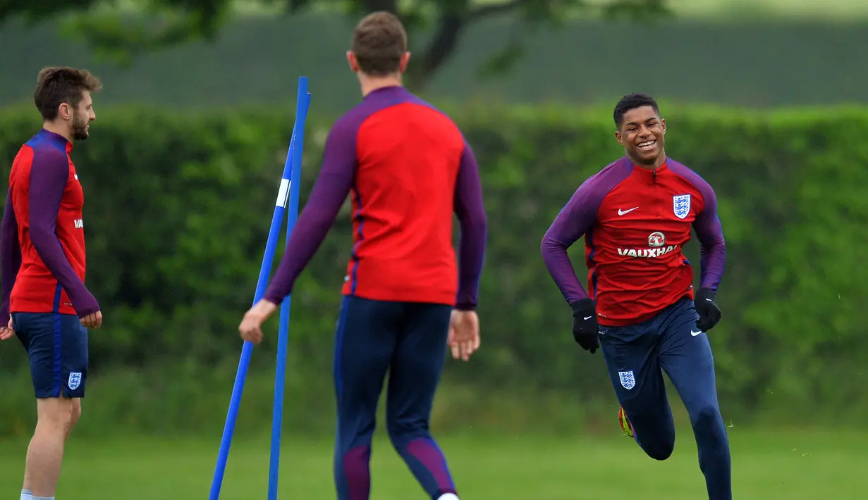 Marcus Rashford masih berusia 18 tahun dan menjadi pemain termuda di skuat Inggris. Penampilan cemerlangnya bersama Manchester United membuat pelatih Inggris, Roy Hodgson, memanggilnya untuk tampil di Piala Eropa 2016. (AFP/Glyn Kirk)