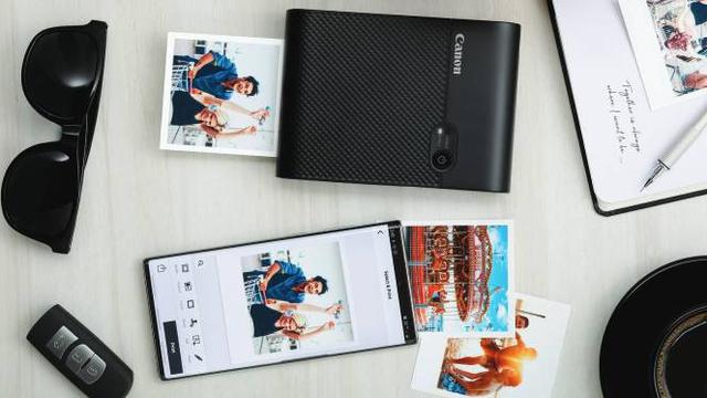 Selphy Square QX10. Dok: Datascrip