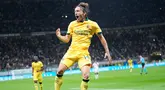 Pemain AC Milan, Luka Modric, melakukan selebrasi setelah mencetak gol ke gawang Bologna dalam giornata ketiga Liga Italia 2025/2026 di Stadion San Siro, Senin (15/9/2025). (AP Photo/Luca Bruno)