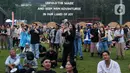 Pengunjung menikmati salah satu penampilan di Joyland Festival Jakarta 2023 di GBK Baseball Stadium, Jakarta, Jumat (24/11/2023). (Liputan6.com/Herman Zakharia)