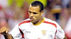 Sevilla's Luis Fabiano celebrates after scoring against Malaga during the Antonio Puerta Trophy at the Ramon Sanchez Pizjuan's stadium in Seville, 23 August 2008. AFP PHOTO/ CRISTINA QUICLER