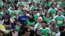 Ribuan peserta mengikuti lomba lari Milo Jakarta International 10K di kawasan Rasuna Epicentrum, Jakarta, Minggu (14/7/2019). Milo Jakarta International 10K diikuti oleh sekitar 16 ribu peserta. (Liputan6.com/Faizal Fanani)
