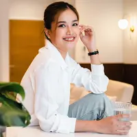 Perempuan tersenyum./Copyright&nbsp;shutterstock.com/g/SOPAPHAN+ROMPHONGOEN