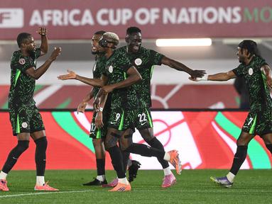 Nigeria berhasil meraih kemenangan besar dalam laga 16 besar Piala Afrika 2025 saat bertemu dengan Mozambik, Senin (05/01/2025) waktu setempat. (AFP/Sebastien Bozon)