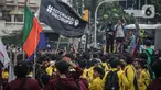 Massa aksi yang tergabung dalam beberapa Badan Eksekutif Mahasiswa akan menggelar unjuk rasa di kawasan Harmoni, Jakarta, Jumat (1/4/2022). Dalam aksinya mereka meminta untuk batalkan wacana perpanjangan masa jabatan presiden serta dibatalkannya wacana penundaan pemilu. (Liputan6.com/Faizal Fanani)