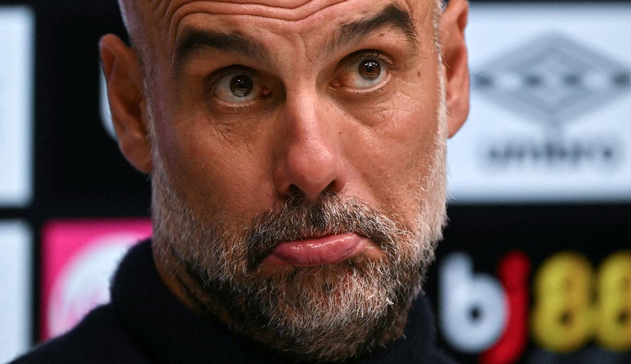 Kekecewaan tersebut bertambah menyusul isu Pep Guardiola yang akan meninggalkan Manchester City pada akhir musim ini. (AFP/Glyn Kirk)