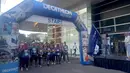 Peserta fun run saat mengikuti event lari bertajuk 'Run and Snap in Tangerang 5k' di Tangerang, Minggu (8/3/2020). Novotel Tangerang gelar event lari yang diikuti ratusan peserta. (Bola.com/Hendry Wibowo)