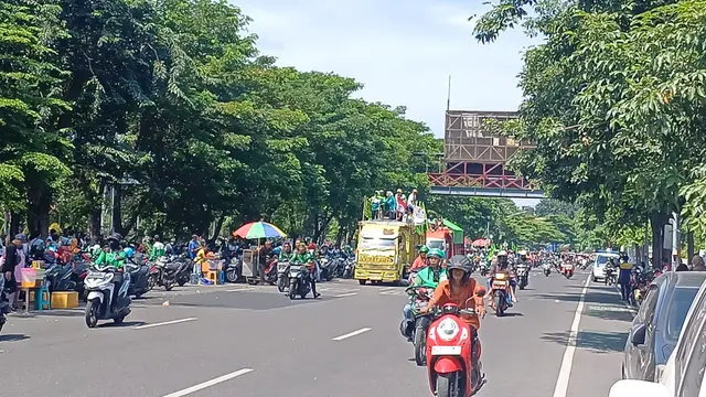 Demo buruh dalam rangka May Day di Surabaya. (Dian Kurniawan/Liputan6.com)