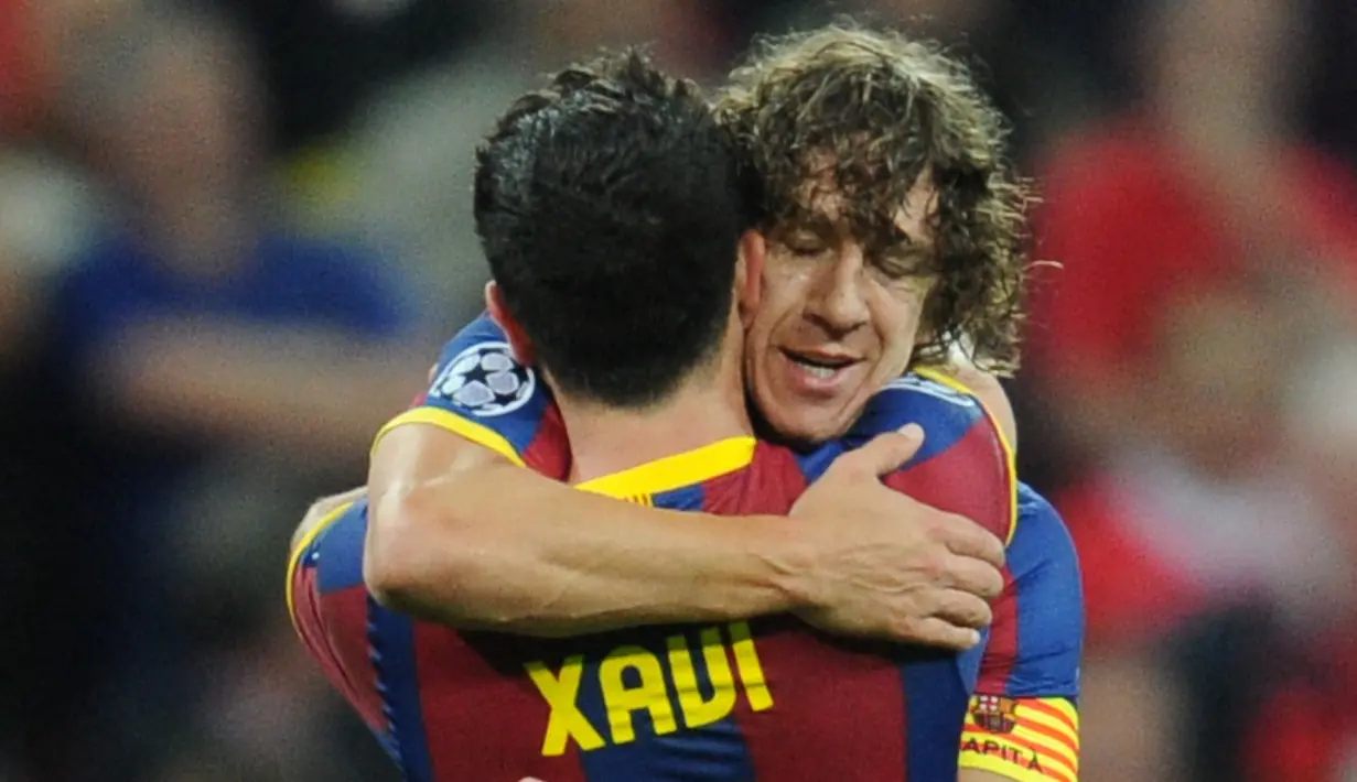 Xavi ditunjuk sebagai kapten Barcelona seiring dengan pensiunnya Carles Puyol di tahun 2014. Di bawah kepemimpinannya, Blaugrana sukses meraih trofi LaLiga, Copa del Rey, dan Liga Champions Eropa musim 2014/2015. (Foto: AFP/Franck Fife)