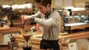 Tak hanya tampan menawan, Xiumin EXO juga berbakat saat membuat kopi. (Foto: Soompi.com)