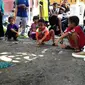 Perayaan Hari Anak Nasional di Medan, Sumut, dimeriahkan berbagai perlombaan permainan tradisional. (Liputan6.com/Reza Efendi)