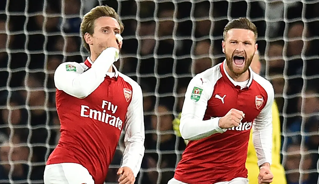 Arsenal termasuk klub yang tidak bisa dilepaskan dengan Liga Spanyol. Banyak pemain yang memilih melanjutkan karier di Liga Spanyol usai memperkuat The Gunners. Seperti 5 pemain berikut, kecuali Francis Coquelin, yang awalnya memang didatangkan dari Liga Spanyol. (AFP/Glyn Kirk)