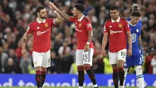 Gelandang Manchester United, Bruno Fernandes, merayakan gol yang dicetaknya ke gawang Chelsea pada laga tunda pekan ke-32 Premier League 2022/2023, Jumat (26/5/2023) dini hari WIB. (AFP/Oli Scarff)