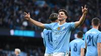 Striker Manchester City, Julian Alvarez turut sumbang gol saat melumat klub Championship Huddersfield pada putaran 3 Piala FA di stadion Etihad (AFP)
