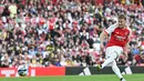 Martin Odegaard, Jorginho, Kai Havertz, Fabio Vieira, dan Gabriel sukses mencetak gol dari tendangan 12 pas untuk Arsenal. (AFP/Glyn Kirk)