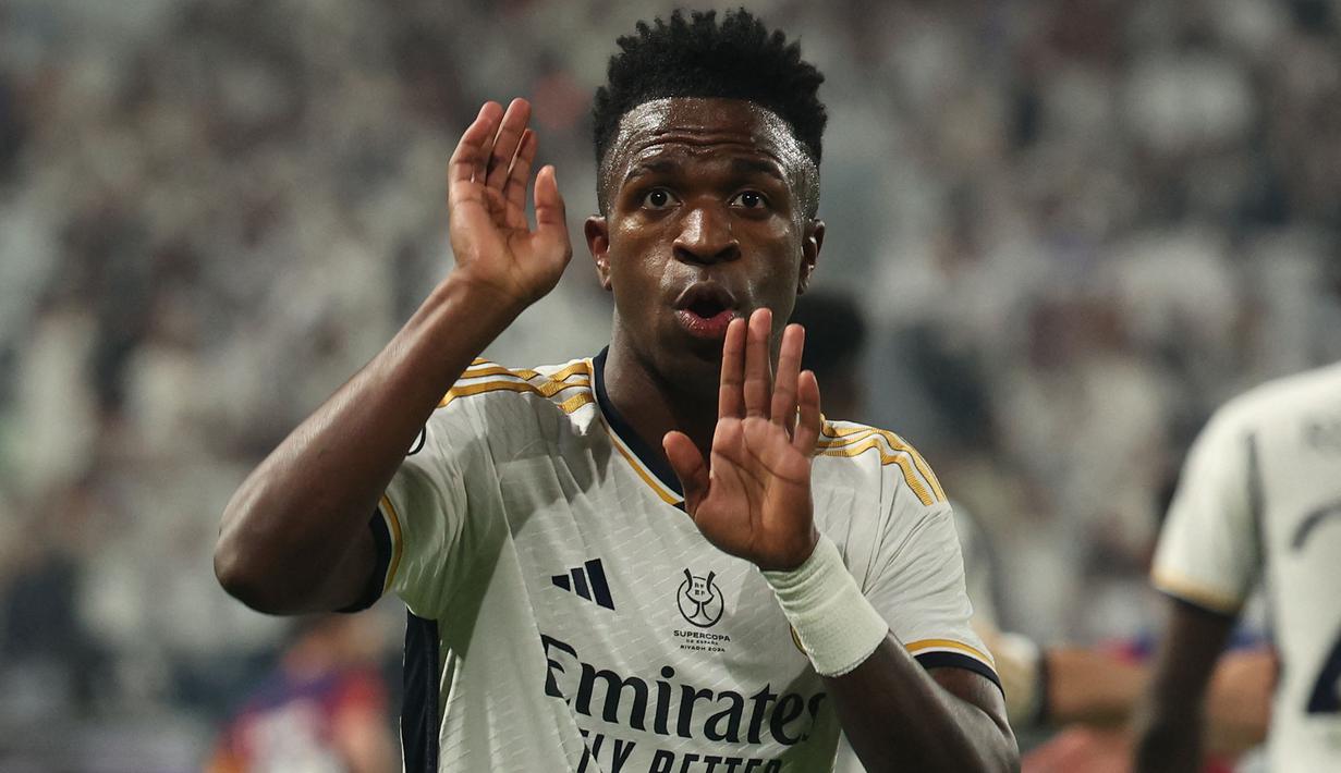 Dari 68 gol yang dikoleksi Vinicius Junior bersama Real Madrid, 6 gol di antaranya dicetak dalam 16 laga El Clasico kontra Barcelona di semua kompetisi, termasuk satu kali hattrick yang baru saja dicetaknya saat menang 4-1 atas Barcelona pada laga final Supercopa de Espana musim 2023/2024 (14/1/2024). (AFP/Giuseppe Cacace)