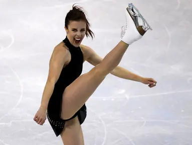 Ashley Wagner Atlet Ice Skating asal Amerika Serikat menunjukan aksinya di atas seluncur es saat mengikuti kejuaraan Ice Skating dunia, ISU Dunia Figure Skating Championships di Boston, Massachusetts, Amerika Serikat, (31/3). (REUTERS/Brian Snyder)
