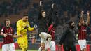 Perayaan kemenangan para pemain AC Milan pada laga perempat final Coppa Italia yang berlangsung di stadion San Siro, Milan, Rabu (30/1). AC Milan menang 2-0 atas Napoli (AP Photo/Antonio Calanni)
