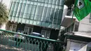 Puluhan orang berpakaian loreng tersebut masih berjaga meski kantor DPP PPP terlihat lengang dari aktivitas kepartaian, Jakarta, (17/9/14). (Liputan6.com/Faizal Fanani) 