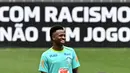Kelalaian sedikit saja bisa membuat Vinicius Junior dkk terpeleset dalam persaingan. (EVARISTO SA/AFP)