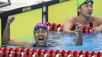 Syuci Indriani perenang Indonesia berhasil meraih medali emas di nomor 100 meter gaya dada klasifikasi SB14 pada Asian Para Games 2018, Gelora Bung Karno Jakarta, Senin (8/10/2018). (Bola.com/Peksi Cahyo)