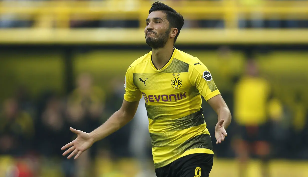 Nuri Sahin yang belum lama pensiun pada Juli 2022 bersama Antalyaspor memulai kariernya bersama Akademi Borussia Dortmund sejak 2001/2002 dan dipromosikan ke tim senior mulai 2005/2006. Pada 2011/2012 ia meninggalkan Dortmund untuk bergabung dengan Real Madrid. Hanya semusim bersama Madrid, ia dipinjamkan ke Liverpool selama setengah musim pada 2012/2013. Pada tengah musim 2012/2013 Madrid kembali meminjamkannya ke Dortmund yang akhirnya mempermanenkannya pada 2014/2015 dan bertahan hingga 2017/2018. Secara keseluruhan ia total tampil dalam 274 laga di semua kompetisi bareng Dortmund dengan torehan 26 gol dan 49 assist. (AFP/Ina Fassbender)