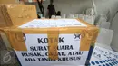 Kotak berisi surat suara yang rusak di Kantor KPUD DKI Jakarta, Selasa (14/2). KPUD DKI Jakarta memusnahkan 46.628 surat suara, dengan rincian 22.444 surat suara yang cacat atau rusak serta 24.184 surat suara baik sisa. (Liputan6.com/Immanuel Antonius)