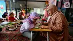 Sejumlah anak mengikuti pesantren kilat di Ruang Publik Terpadu Ramah Anak (RPTRA) Malinjo, Jakarta, Minggu (17/3/2024). (Liputan6.com/Angga Yuniar)
