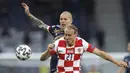Kroasia menurunkan tempo di 10 menit akhir pertandingan. Tidak ada gol tambahan. Wasit pun meniup peluit panjang. Skor 3-1 untuk kemenangan Kroasia membuat Skotlandia harus angkat koper lebih cepat. (Foto: AP/Pool/Lee Smith)