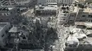Hamas, kelompok militan di balik serangan mematikan pada 7 Oktober yang menewaskan sekitar 1.200 orang di Israel, memiliki banyak basis di lingkungan padat penduduk Gaza. Israel menargetkan benteng-benteng tersebut. (AP Photo/Hatem Moussa, File)
