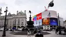 Pemandangan Piccadilly Circus di London, Inggris (18/3/2020). PM Inggris Boris Johnson pada Rabu (18/3) mengatakan seluruh sekolah akan ditutup mulai Jumat (20/3) setelah otoritas kesehatan mengonfirmasi total 2.626 kasus infeksi COVID-19 dan 104 kematian akibat penyakit tersebut. (Xinhua/Tim Irelan