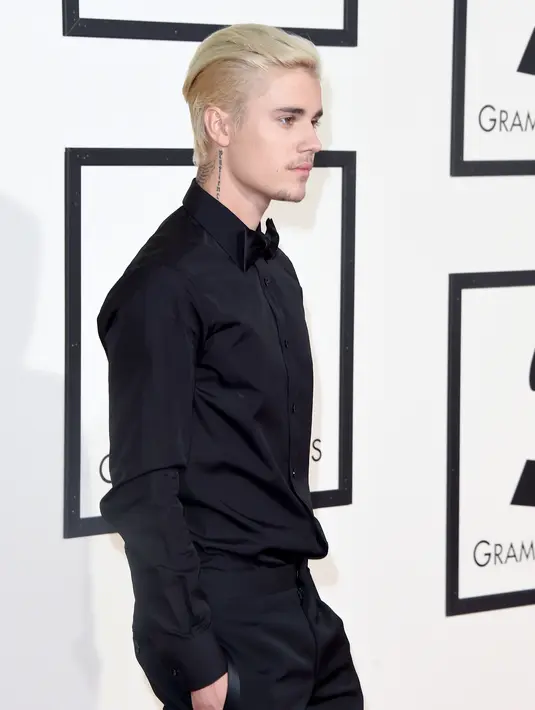 Justin Bieber selalu bersikap angkuh dan aneh karena dirinya tak suka jika diperlakukan mirip binatang yang selalu tunduk dan menurut. (AFP/Bintang.com)