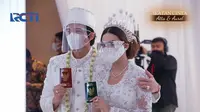 "Saya terima nikah dan kawinnya Titania Aurelie Nur Hermansyah bin Anang Hermansyah dengan mas kawin tersebut, tunai," ucap Atra Halilintar. (Livestreaming RCTI)