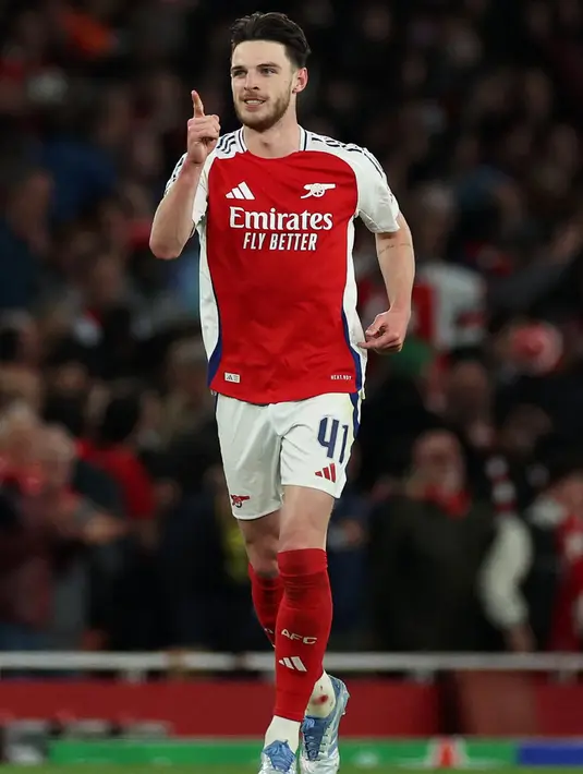 Menit ke-70, Arsenal menggandakan keunggulan. Tendangan keras Declan Rice kembali menaklukkan penjaga gawang Real Madrid, Thibaut Courtois. (Adrian Dennis/AFP)