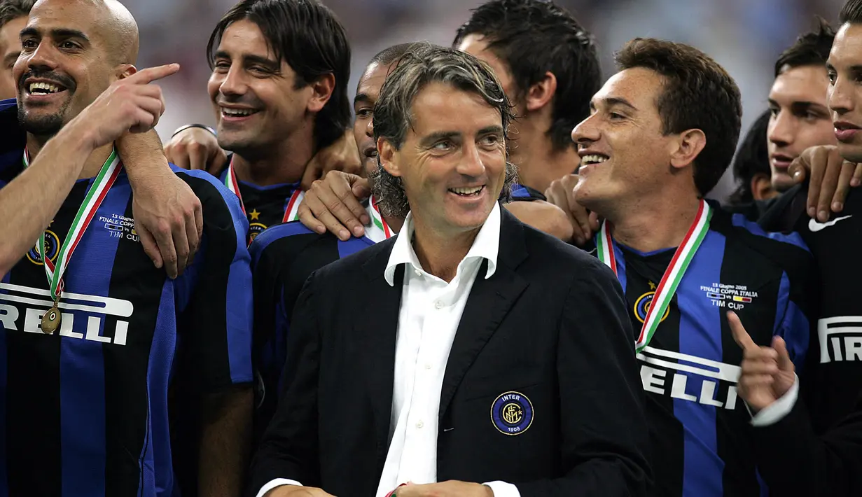 Mancini juga mampu mempersembahkan dua trofi Coppa Italia. Selama empat tahun kebersamaan mereka, Mancini berhasil mempersembahkan tujuh gelar untuk Inter Milan. (Foto: AFP/Filippo Monteforte)