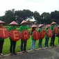 Aksi terima kasih tembakau dari Komunitas Kretek di Tugu Tani, Jakarta (Liputan6.com/ Oscar Ferri)