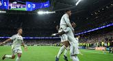 Gelandang tengah Real Madrid asal Inggris, Jude Bellingham merayakan golnya pada matchday 3 Liga Champions 2025/2026 di Stadion Santiago Bernabeu, Madrid, Spanyol, Rabu (22/10/2025) waktu setempat atau Kamis (23/10/2025) dini hari WIB. (Thomas COEX/AFP)