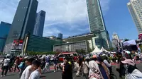 Suasana di sekitar Bundaran Hotel Indonesia (HI) saat pelantikan Presiden-Wakil Presiden RI. (Liputan6.com/Hisyam)