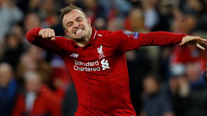 Gelandang Liverpool, Xherdan Shaqiri berselebrasi setelah akhir laga kedua semifinal Liga Champions 2018/19, melawan Barcelona di Anfield, Selasa (7/5/2019).  Liverpool sukses melaju ke final Liga Champions usai tampil sensasional menghajar Barcelona 4-0. (REUTERS/Phil Noble)