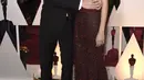 Penyanyi Adam Levine dan model Behati Prinsloo menghadiri Academy Awards Tahunan ke-87 di Hollywood & Highland Center di Hollywood, California pada 22 Februari 2015. Isu perselingkuhan Adam Levine terkuak saat influencer media sosial Sumner Stroh menyebarkan berbagai bukti mencengangkan. (Frazer Harrison/Getty Images/AFP)