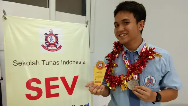 Pelari autis, Ruben Rotty menang medali perak Asean Autism Games 2018 (Liputan6.com/Giovani Dio PrasastI)