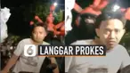 Pemuda itu nampak masih cemas ketika dibawa petugas berkostum untuk diberi sanksi.