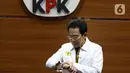 Wakil Ketua KPK Johanis Tanak sesaat sebelum membacakan penetapan tersangka dan penahanan Wakil Ketua DPRD Provinsi Jawa Timur 2019-2024, Sahat Tua P. Simandjuntak di Gedung Merah Putih Komisi Pemberantasan Korupsi (KPK), Jakarta, Kamis (15/12/2022). Sahat Tua P. Simandjuntak bersama tiga orang lainnya terjerat OTT KPK berikut barang bukti uang dengan nilai seluruhnya Rp1 miliar. (Liputan6.com/Helmi Fithriansyah)