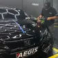 Proses perawatan bodi kendaraan oleh Aegis Auto Detailing. (ist)