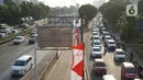 Kendaraan melintasi jalan tol di Jakarta, Kamis (27/8/2020). Gubernur DKI Jakarta Anies Baswedan mengusulkan agar Tol Dalam Kota dapat dilintasi oleh pengendara sepeda jenis road bike karena banyak masyarakat yang berolahraga dan menjadikan sepeda sebagai gaya hidup. (Liputan6.com/Immanuel Antonius)