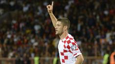 Pemain Kroasia, Andrej Kramaric, melakukan selebrasi setelah mencetak gol ke gawang Armenia pada laga Kualifikasi Euro 2024 di Stadion Vazgen Sargsyan Republican, Armenia, Senin (11/9/2023). Kroasia menang dengan skor 1-0. (AFP/Karen Minasyan)