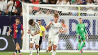Gelandang muda Real Madrid asal Argentina, Nico Paz, merayakan gol yang dicetaknya ke gawang Barcelona dalam laga pramusim di MetLife Stadium di East Rutherford, New Jersey, 3 Agustus 2024. (Charly TRIBALLEAU / AFP)